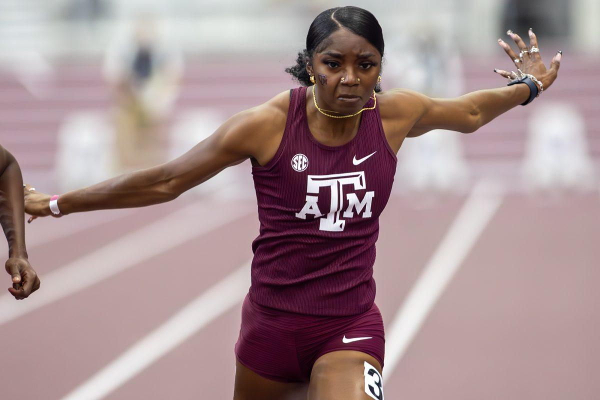 Texas A&amp;M sophomore Jaiya Covington runs through the finish line during the Charlie Thomas Invitational at the Murray Fasken Indoor Track on Saturday, Feb. 3, 2024. (CJ Smith/The Battalion)