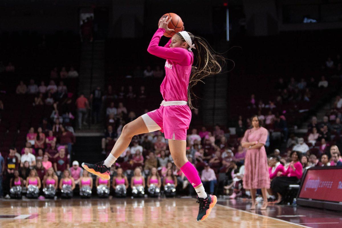 Graduate guard Endyia Rogers leaps for a  ball during Texas A&Ms game against Mississippi State on Feb. 4, 2024, at Reed Arena. (Adriano Espinosa/ The Battalion)