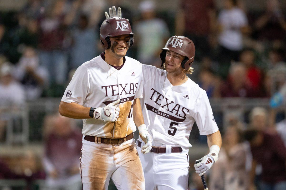 Texas A&M outfielder Jace Laviolette (17) and outfielder Hayden Schott (5) react react during Texas A&M’s game against Lamar on Tuesday, Feb. 27, 2024 at Blue Bell Park. (Chris Swann/The Battalion)