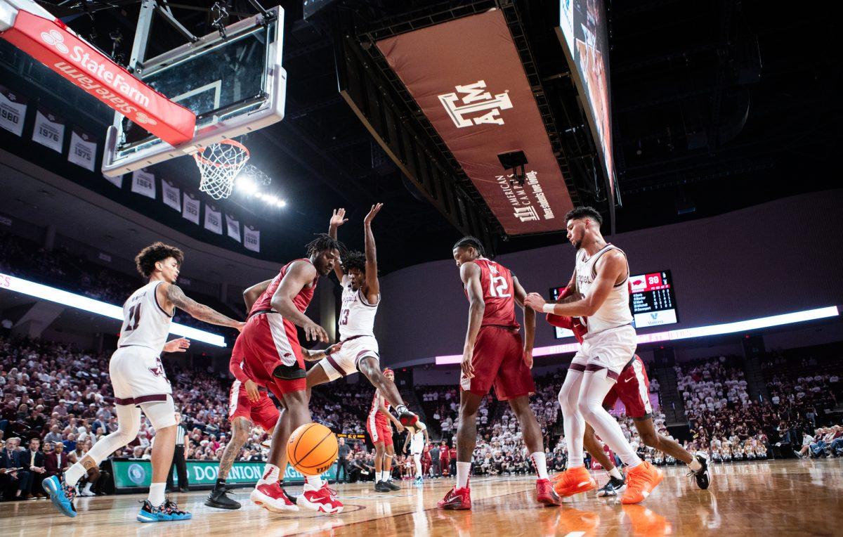 Texas A&M Aggies forward Solomon Washington (13) reacts during Texas A&M’s game against Arkansas on Tuesday, Feb. 20, 2024, at Reed Arena. (Jaime Rowe/The Battalion)