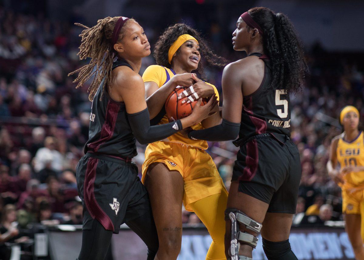 LSU Lady Tigers guard Aneesah Morrow (24) fights for the ball against Texas A&M Aggies guard Aicha Coulibaly (5) and Texas A&M Aggies forward Janiah Barker (2) during Texas A&M’s game against LSU on Friday, Feb. 19, 2024, at Reed Arena. (Ishika Samant/The Battalion)