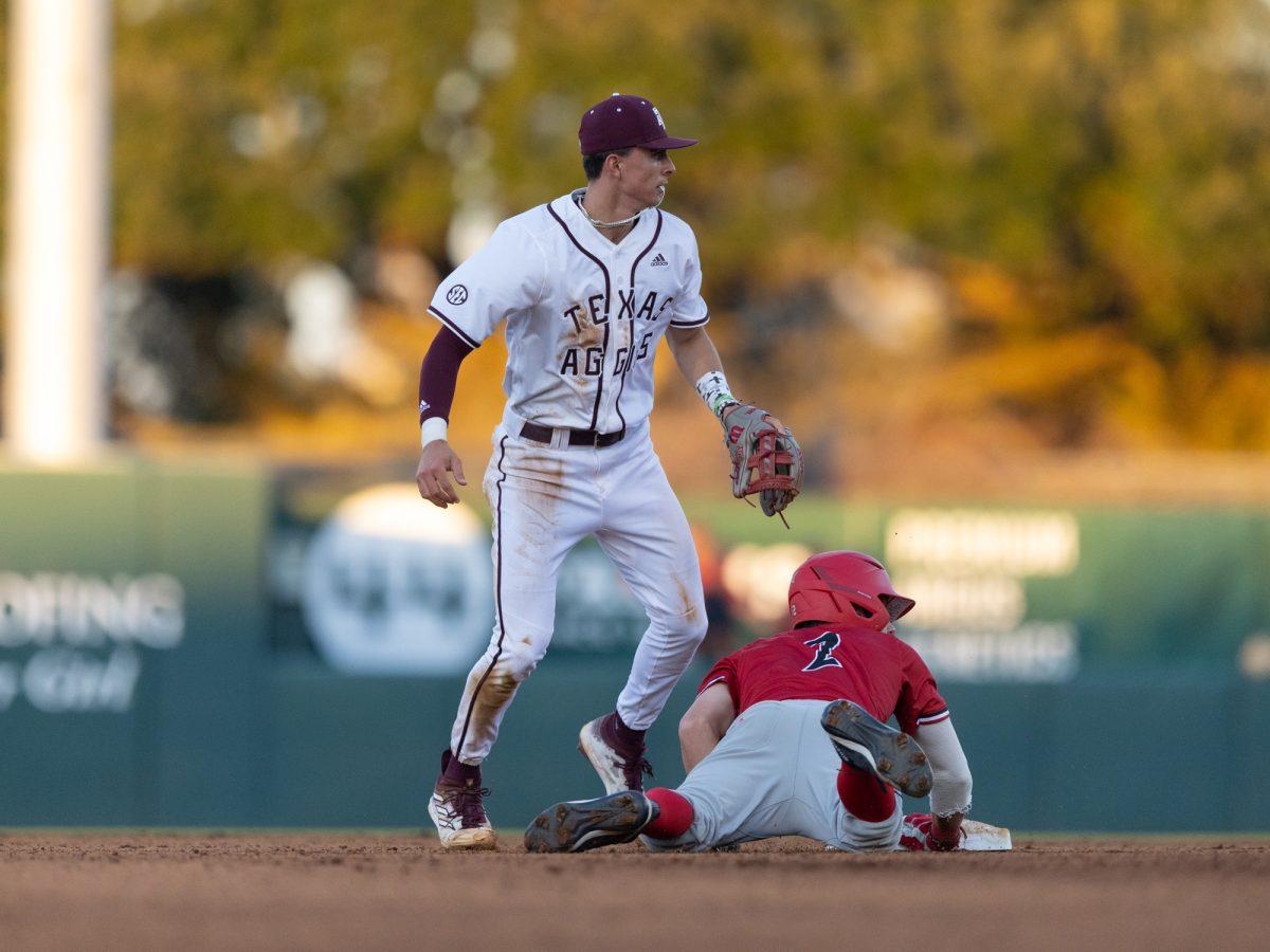 Ali Camarillo (2) waiting to see if he got the out during Texas A&Ms game against UIW on Tuesday, Feb. 20, 2024 at Olsen Field. (Hannah Harrison/The Battalion)