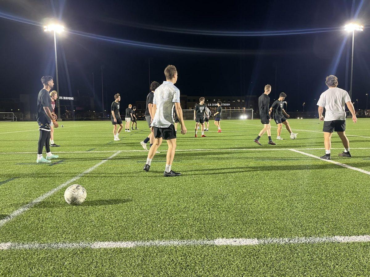 The A&M men’s club soccer team warms up on Feb. 21 at Penberthy Rec Sports Complex before practice ahead of their March 2 match against I&I FC. (Photo by Mathias Cubillan/JOUR 359 Contributor)