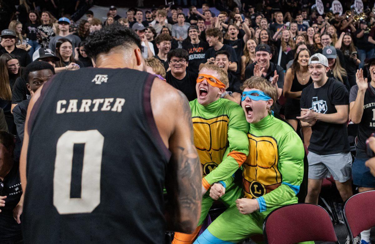 Fans celebrate with Texas A&amp;M Aggies guard Jace Carter (0) during Texas A&amp;M’s game against Florida on Saturday, Feb. 3, 2024, at Reed Arena. (Ishika Samant/The Battalion)