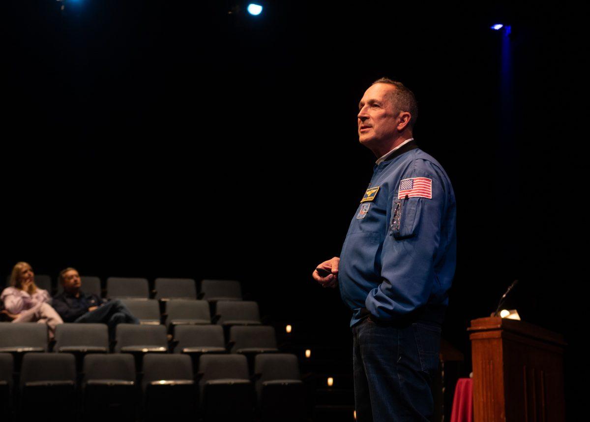 Commander John B. Herrington speaks during his Astro Story talk at Rudder Theatre on Friday, Feb. 16, 2024. (Photo by Rocio Salgado/The Battalion)