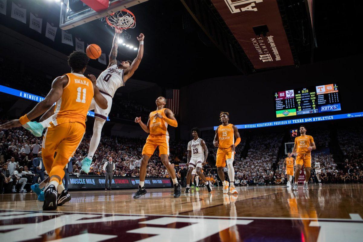 Texas A&amp;M Aggie's Jace Carter (0) dunks the ball during Texas A&amp;M's game against Tennessee on Saturday, Feb. 10, 2024 at Reed Arena. (Hannah Harrison/The Battalion)