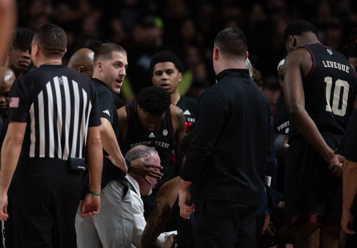 Manager Calvin Williams in the huddle during Texas A&M’s game against Florida on Saturday, Feb. 3, 2024, at Reed Arena. (Ishika Samant/The Battalion)