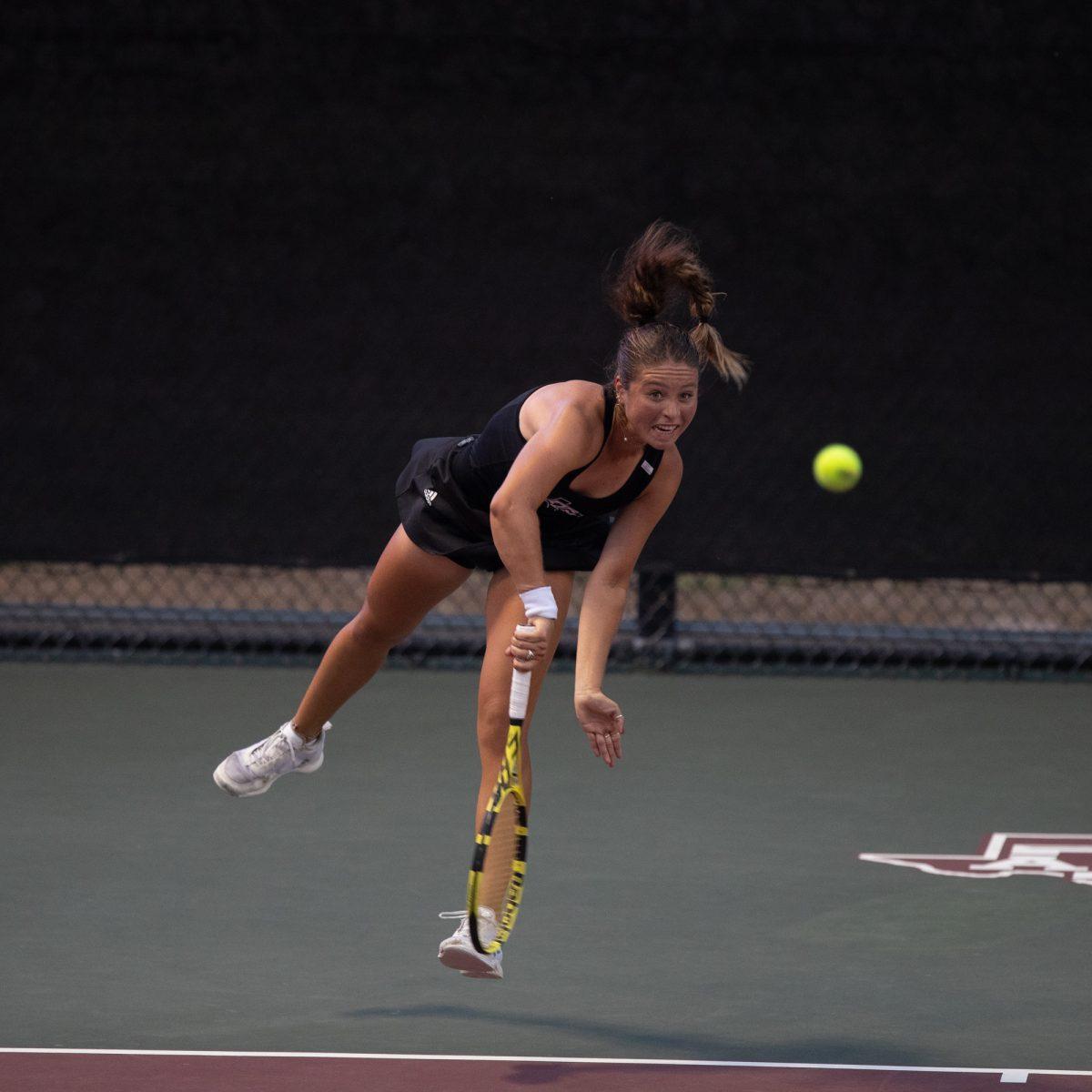 Junior Jeanette rallying for the point during Texas A&Ms game against SMU on Tuesday, Feb. 27, 2024 at Mitchell Tennis Center. (Hannah Harrison/The Battalion)