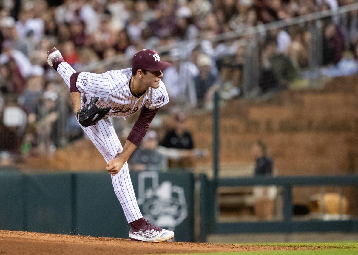 Texas A&M pitcher Ryan Prager (18) pitches during Texas A&M’s  game against McNeese on Friday, Feb. 16, 2024, at Blue Bell Park. (Lana Cheatham/The Battalion)