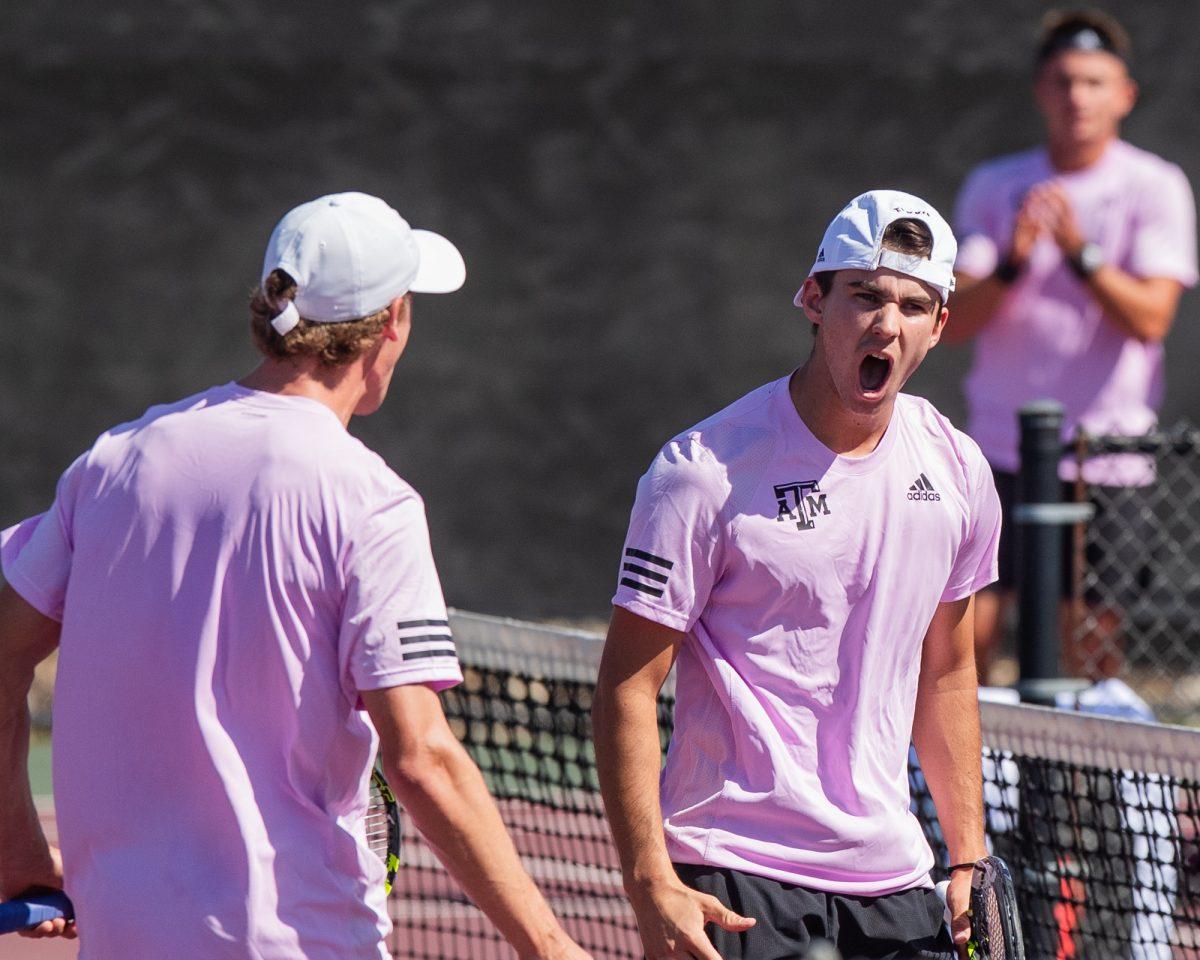 Graduate Student Kenner Taylor and Junior Luke Casper react to their doubles win, and A&Ms first point at Texas A&Ms match against Pepperdine on Sunday, Feb. 25, 2024, at the Mitchell Tennis Center. (© Connor May/The Battalion)
