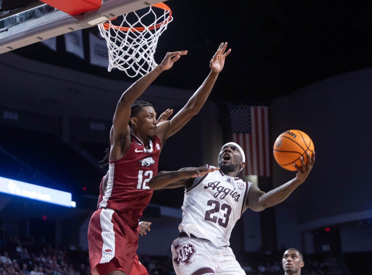 Texas A&Ms graduate G Tyrece Radford (23) goes up for a point during Texas A&Ms game against Arkansas on Feb. 20, 2024 at Reed Arena. (Jaime Rowe/The Battalion)