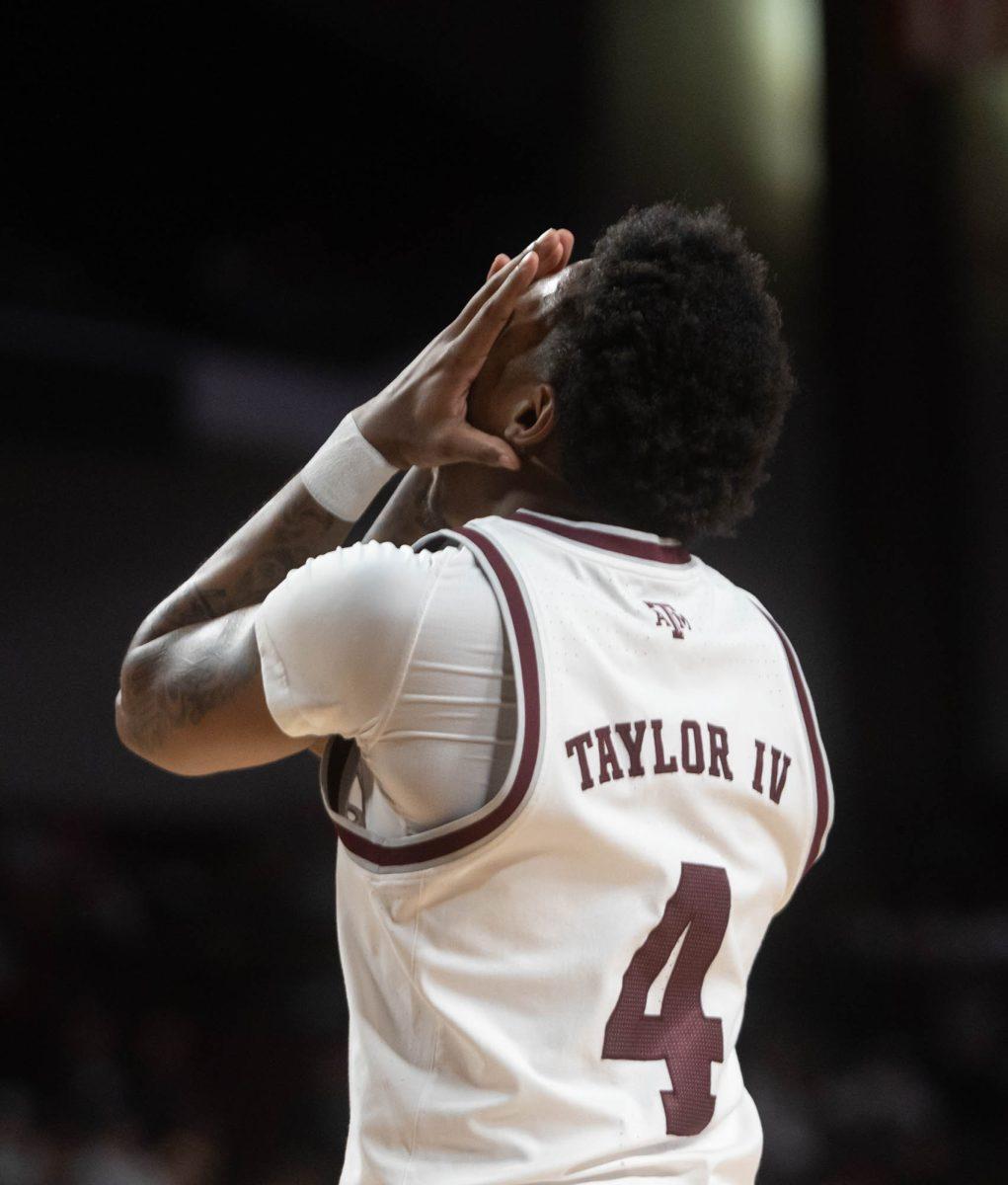 Junior G Wade Taylor IV (4) covers his face after a missed point during Texas A&Ms game against Arkansas on Feb. 20, 2024 at Reed Arena. (Jaime Rowe/The Battalion)