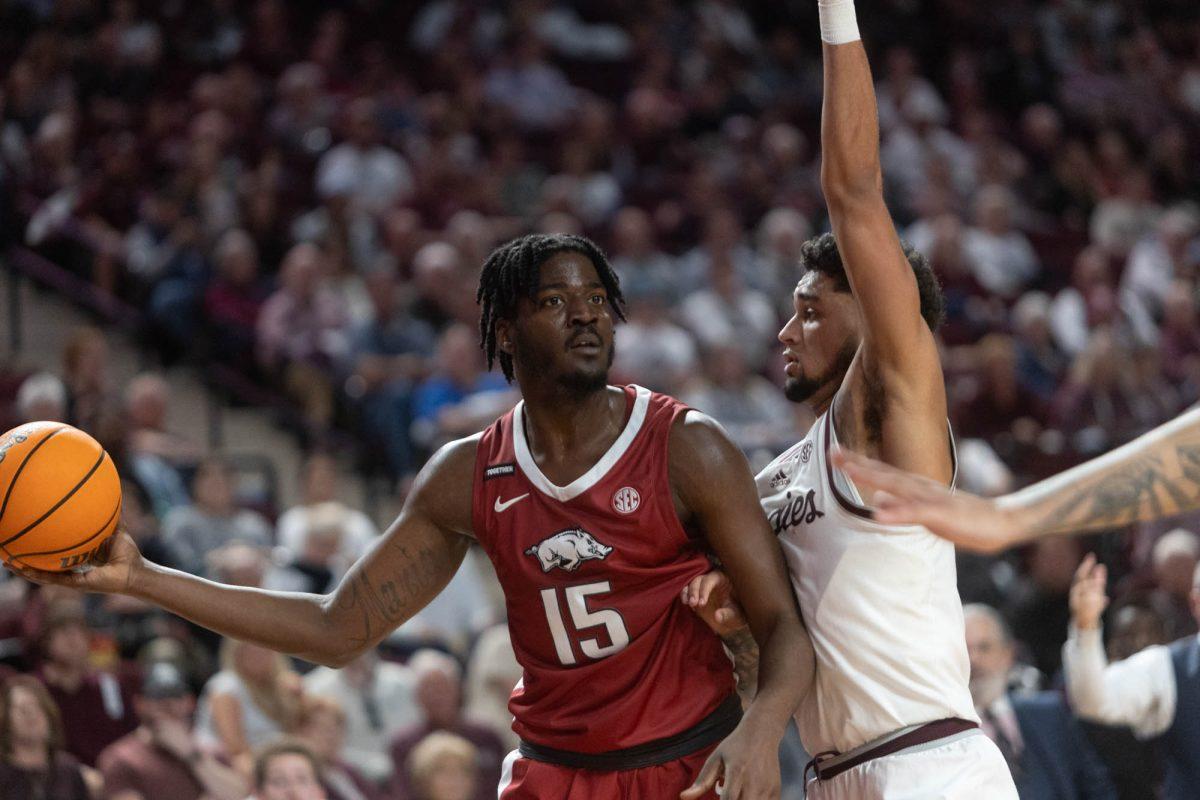 Arkansas Senior F Makhi Mitchell (15) looks to pass the ball during Texas A&Ms game against Arkansas on Feb. 20, 2024 at Reed Arena. (Jaime Rowe/The Battalion)