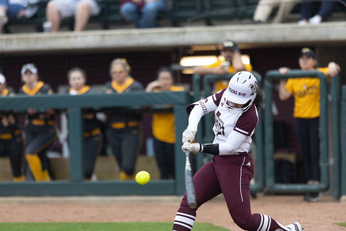 Sophomore OF Keely Williams (18) hits the ball during Texas A&Ms game against Valpo on Feb. 10, 2024 at Davis Diamond.