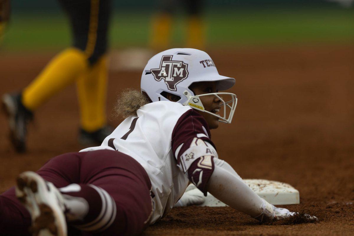 Sophomore INF Kennedy Powell (1) slides into third base during Texas A&Ms game against Valpo on Feb. 10, 2024 at Davis Diamond.