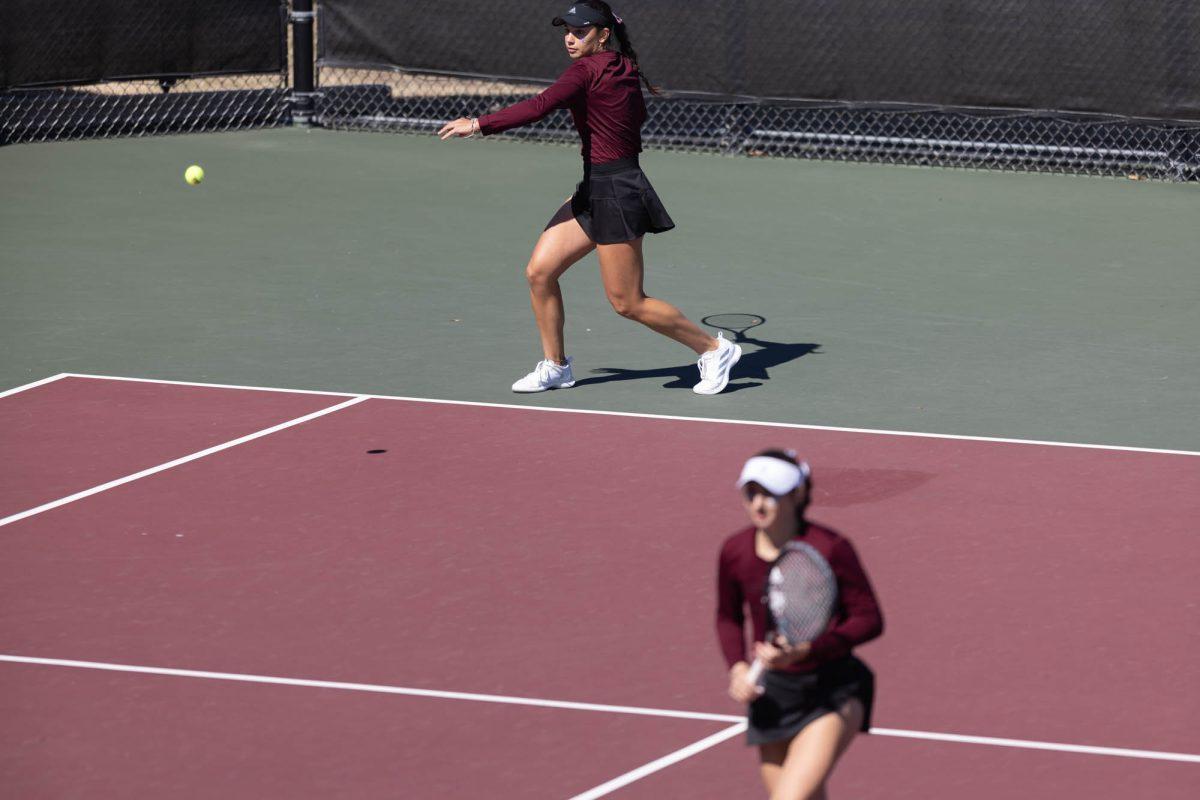 Sophomore Mia Kupres returns the serve during Texas A&Ms match against Rice on Feb. 18, 2024 at the Mitchell Outdoor Tennis Center.