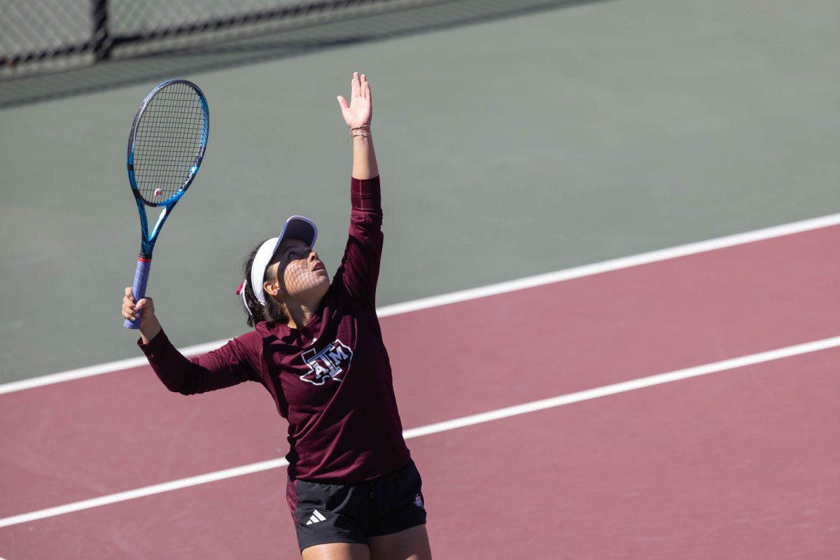 Freshman Lucciana Perez serves the ball during Texas A&Ms match against Rice on Feb. 18, 2024 at the Mitchell Outdoor Tennis Center.