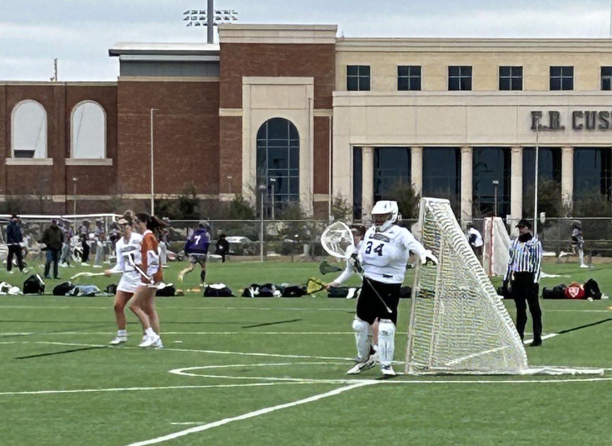 A&M women’s lacrosse senior goalie Kaylynn Collins calls out to a defender during the Feb. 17 win over UT at Penberthy Rec Center. (Photo by Samuel Sidarous, JOUR 359 contributor)