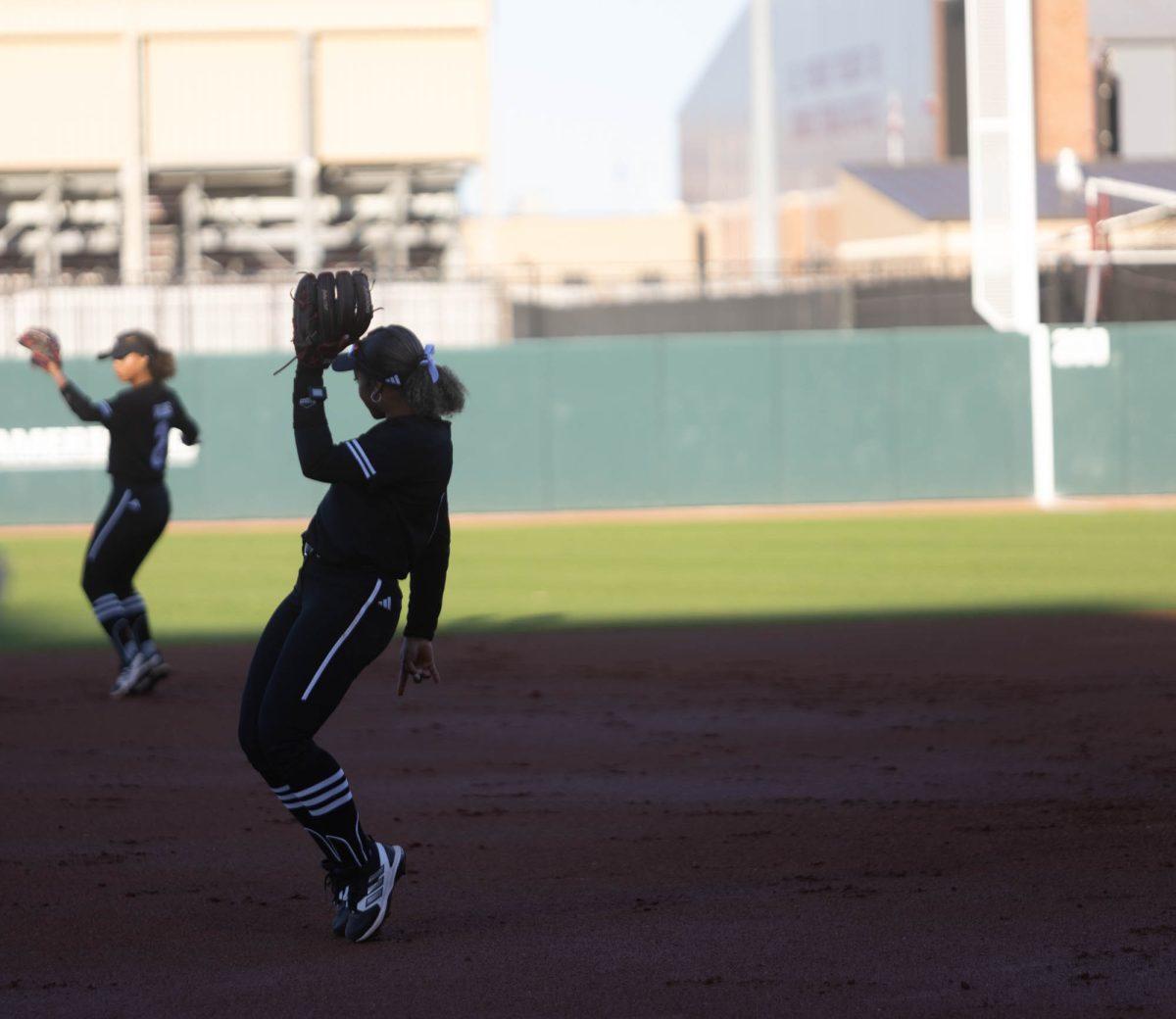 Sophomore INF Kennedy Powell (1) celebrates with Senior INF Rylen Wiggins (2) during Texas A&Ms game against Kansas State on Feb. 24, 2024 at Davis Diamond. (Jaime Rowe/The Battalion)