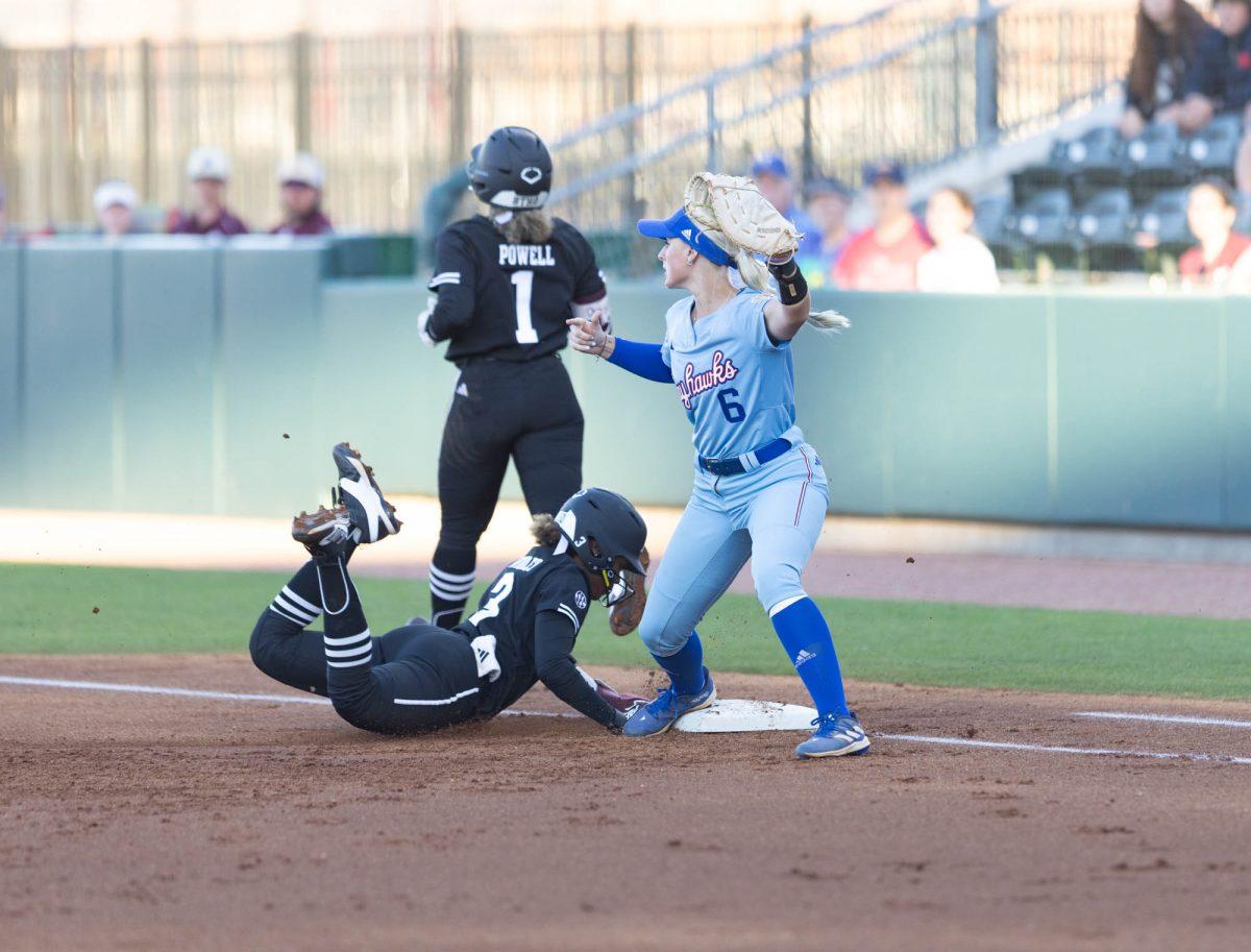 Kansas State Sophomore INF Campbell Bagshaw (6) gets out Texas A&M Junior INF Koko Wooley (3) during Texas A&Ms game against Kansas State on Feb. 24, 2024 at Davis Diamond. (Jaime Rowe/The Battalion)