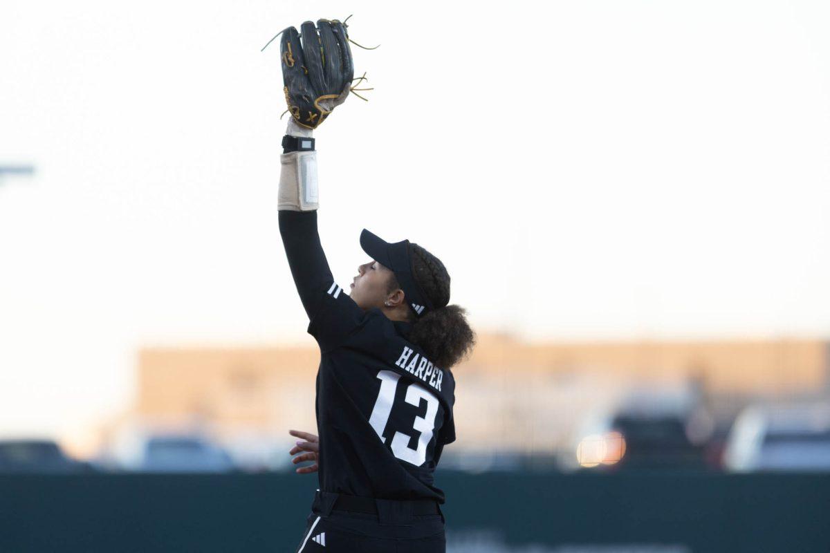 Sophomore INF Amari Harper (13) catches the ball during Texas A&Ms game against Kansas State on Feb. 24, 2024 at Davis Diamond. (Jaime Rowe/The Battalion)