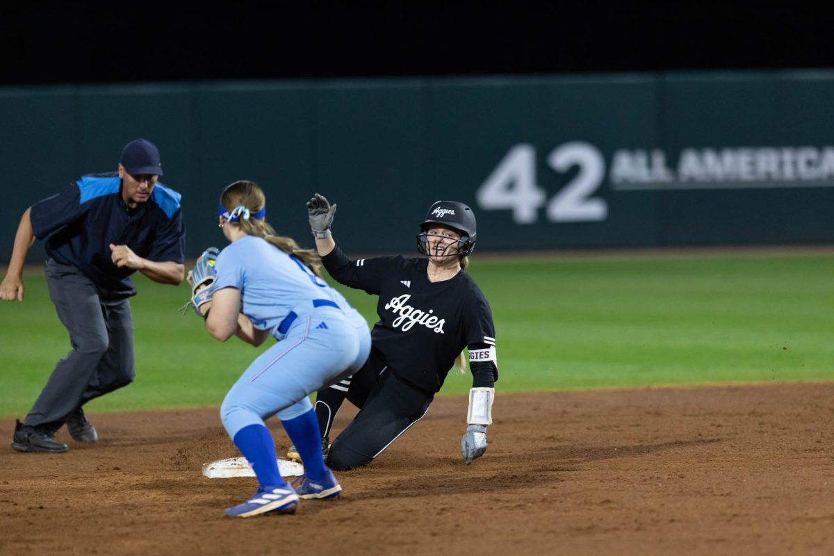 Senior C Julia Cottrill (42) slides into third base during Texas A&Ms game against Kansas State on Feb. 24, 2024 at Davis Diamond. (Jaime Rowe/The Battalion)