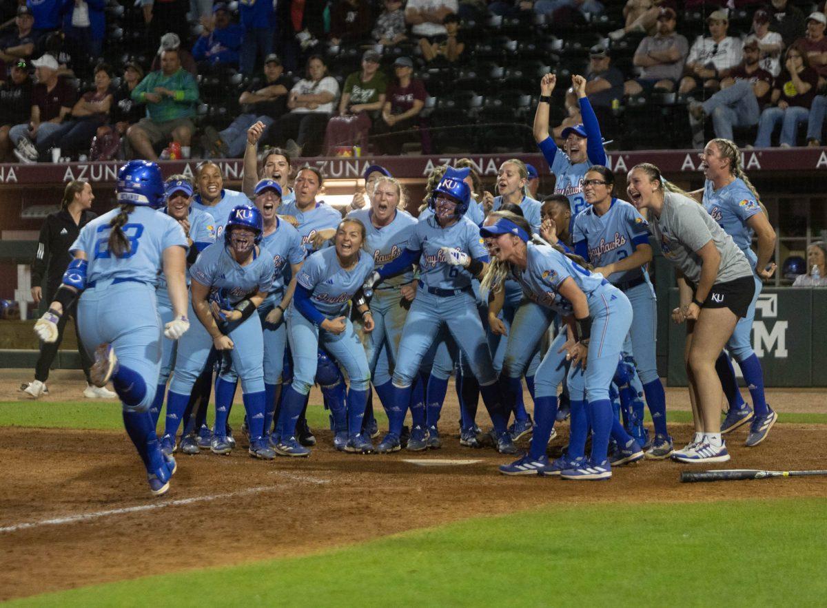 Kansas State celebrates the game winning score against Texas A&Ms on Feb. 24, 2024 at Davis Diamond. (Jaime Rowe/The Battalion)