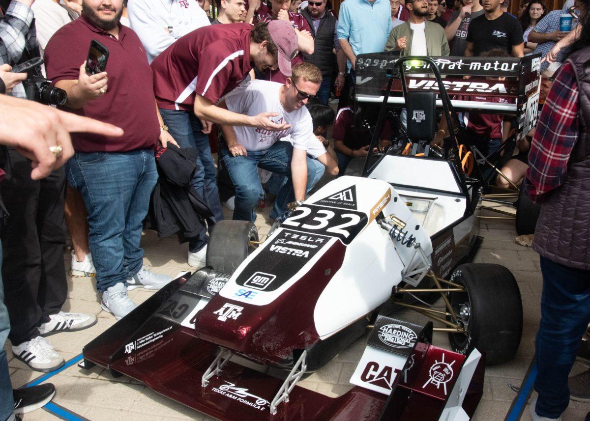 The EV team displaying their car on March 24, 2024 at Aggie Park.