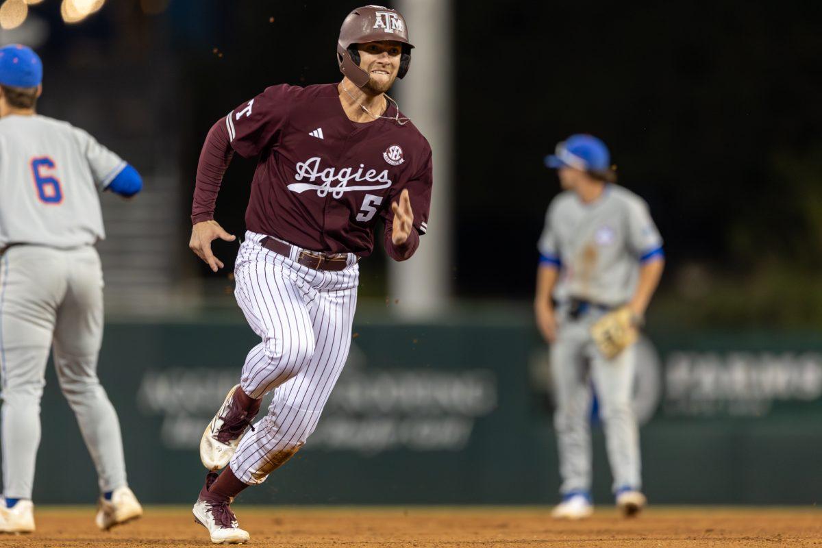Senior OF Hayden Schott (5) runs to third base during A&M's games against Houston Christian University on Tuesday, March 26, 2024, at Olsen Field. (CJ Smith/The Battalion)