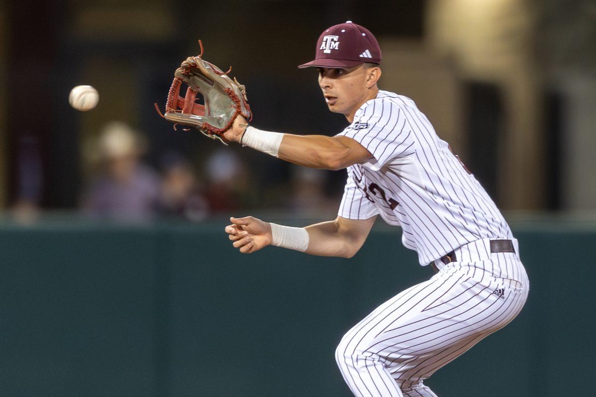 Junior INF Ali Camarillo (2) catches a hard ground ball during A&Ms games against Rhode Island on Friday, March 8, 2024, at Olsen Field. (CJ Smith/The Battalion)