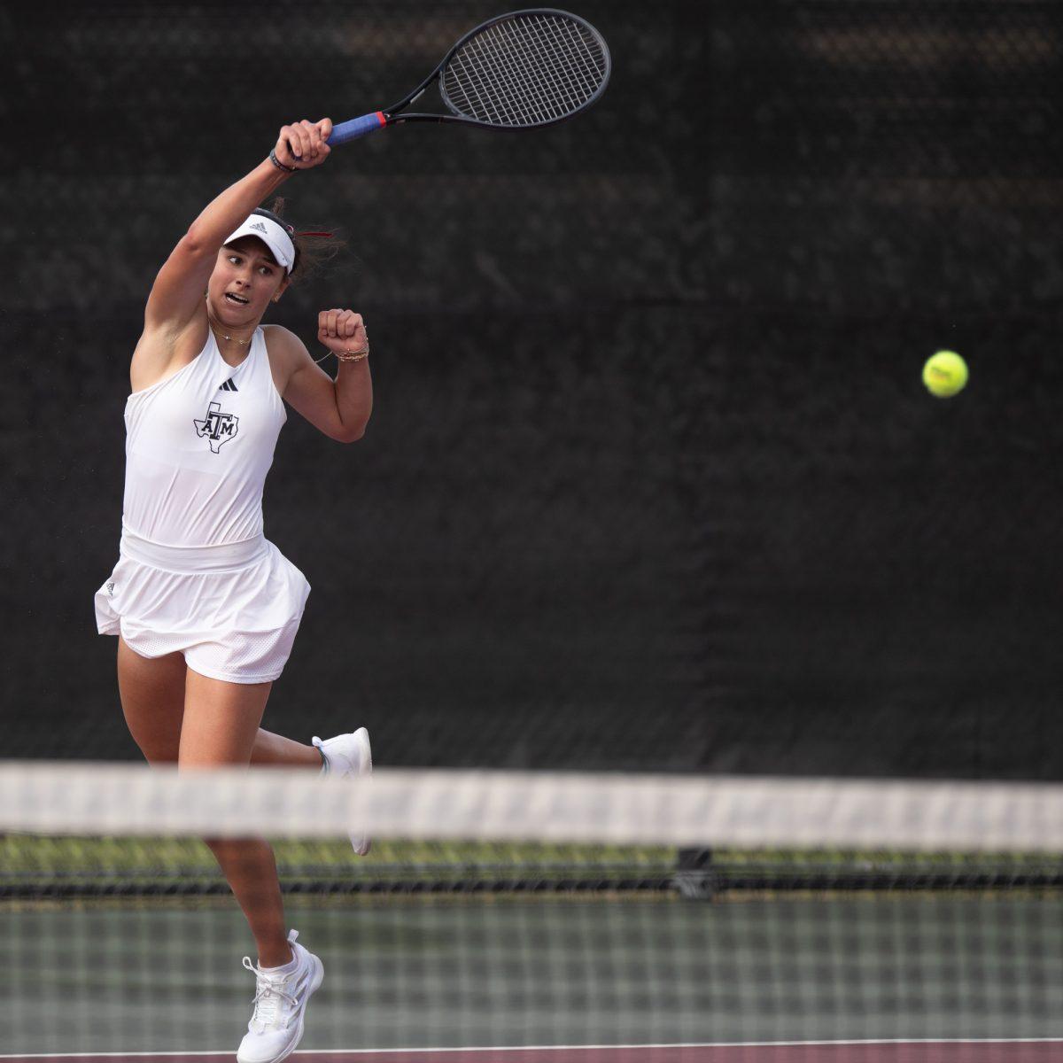 Sophomore Mia Kupres returns the ball at Texas A&Ms match against Florida on Sunday, March 3, 2024, at the Mitchell Tennis Center. (© Connor May/The Battalion)