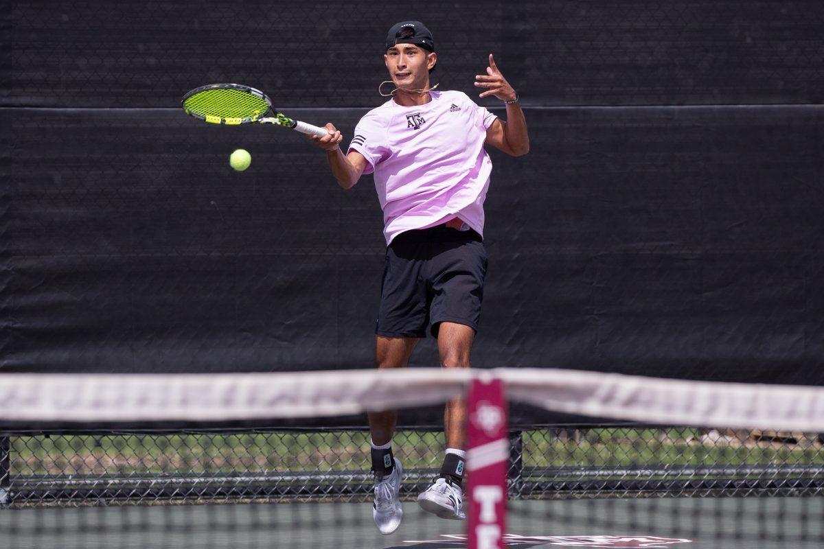 Junior JC Roddick returns the ball During Texas A&Ms match against Ole Miss on Sunday, March 10, 2024 at Mitchell Tennis Center. (Connor May/The Battalion)