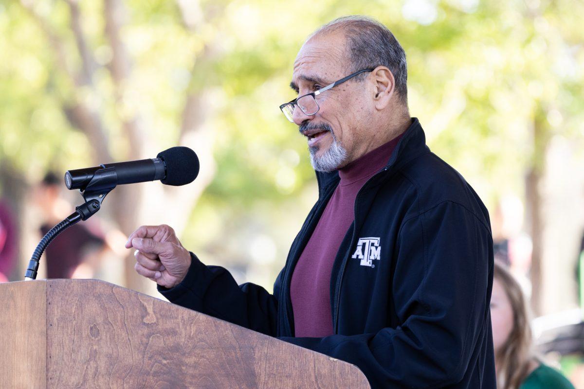 Vice President for Student Affairs Joe E. Ramirez Jr. speaks at The Big Event's opening ceremony. (Adriano Espinosa/The Battalion)