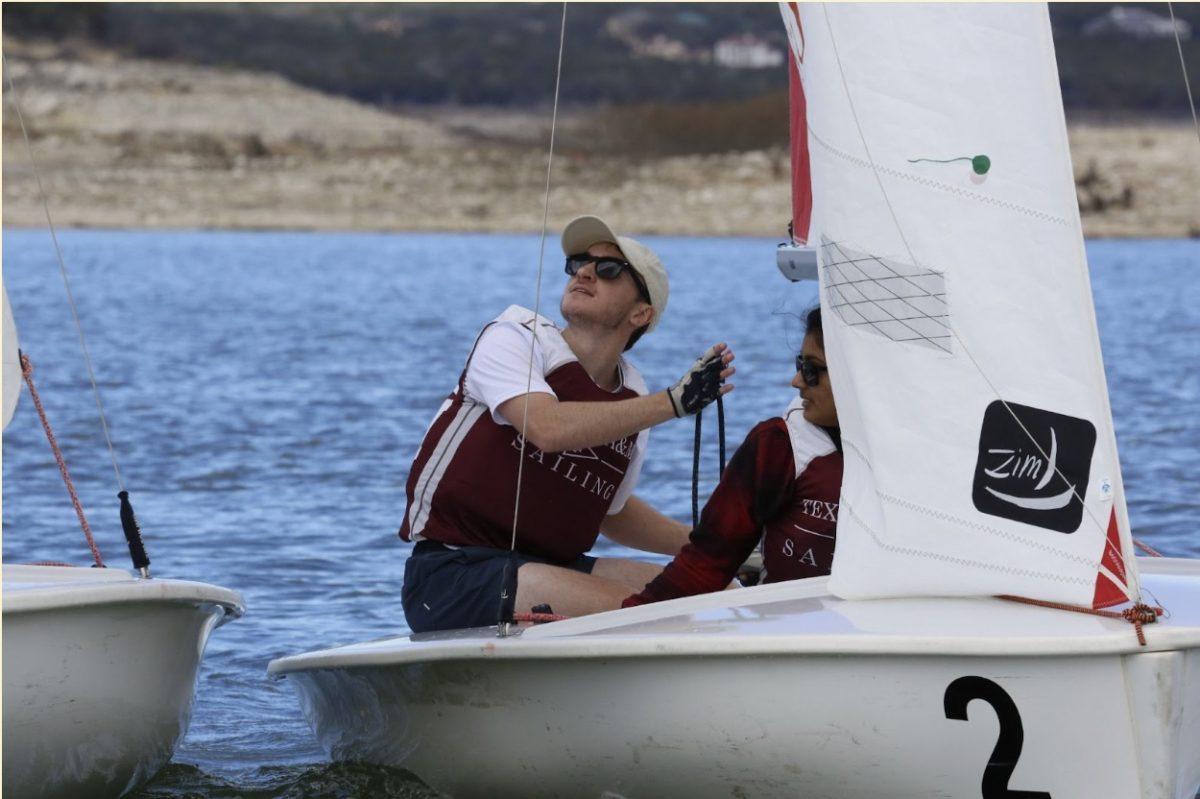 Sailing team president Cole Broberg and industrial engineering senior Isha Pokerna during the Austin Regatta on Feb. 3 at the opening event of the spring season. (Photo by Kate Hennig/JOUR 359 Contributor)