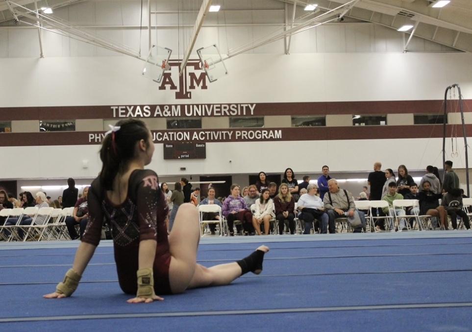 Megan Rodriguez performing her floor exercise routine on March 23 at the Physical Education Activity Program building on West Campus. (Photo by Raquel Eichelmann)
