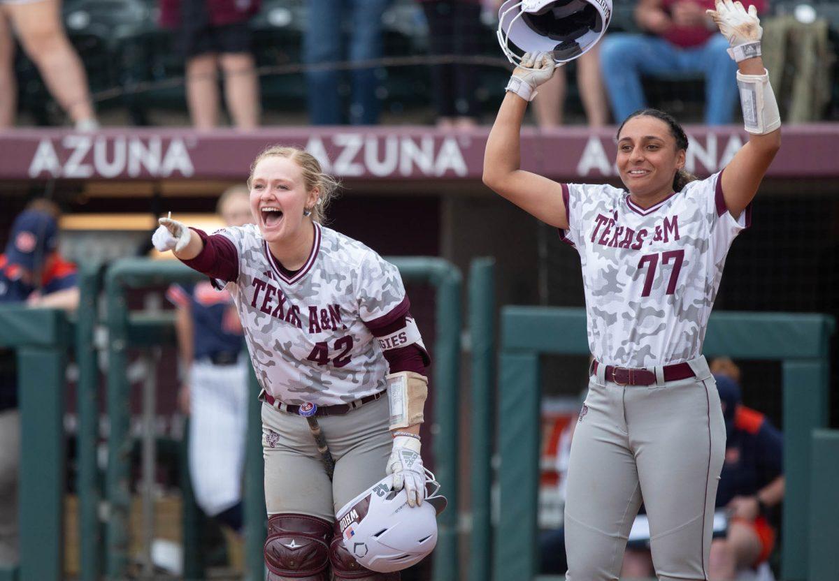 Texas A&M catcher Julia Cottrill (42) and Texas A&M outfielder Jazmine Hill (77) react during Texas A&Ms game against Auburn on Sunday, March 24, 2024, at Davis Diamond. (Lana Cheatham/The Battalion)