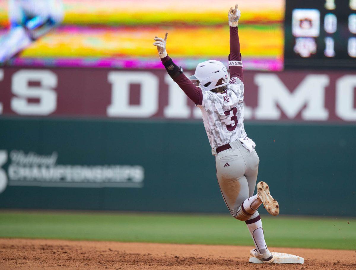 Texas A&M infielder Koko Wooley (3) reacts during Texas A&Ms game against Auburn on Sunday, March 24, 2024, at Davis Diamond. (Lana Cheatham/The Battalion)