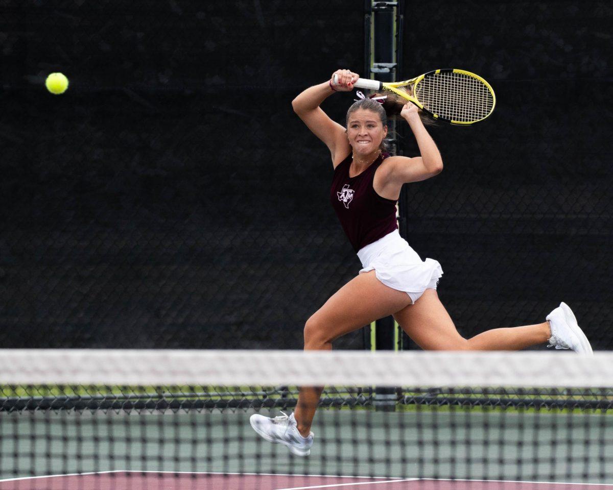 Junior Jeanette Mireles returns the ball at Texas A&M's match against Kentucky at the Outdoor Mitchell Tennis Center on Sunday, March 24, 2024. (Connor May/The Battalion)