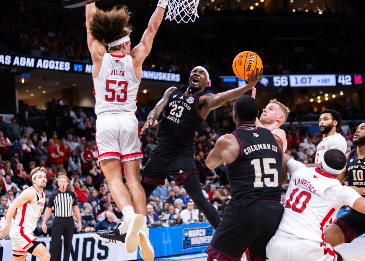 Graduate G Tyrece Radford (23) drives to the basket during Texas A&Ms game against Nebraska in the first round of the 2024 NCAA Tournament at FedExForum in Memphis, Tennessee, on Friday, March 22, 2024. (Kyle Heise/The Battalion)