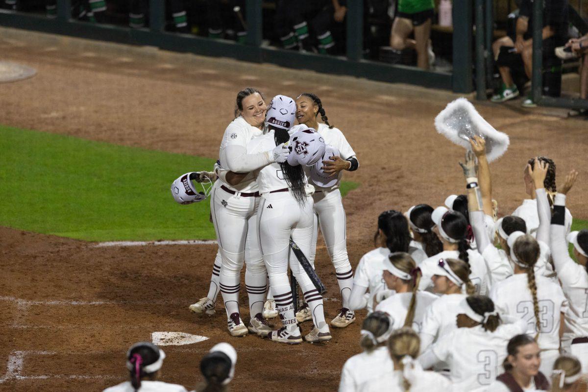 Sophomore INF Aiyana Coleman (17) and the team celebrate after hitting a home run during Texas A&M's game against UNT on March 6, 2024 at Davis Diamond. (Jaime Rowe/The Battalion)