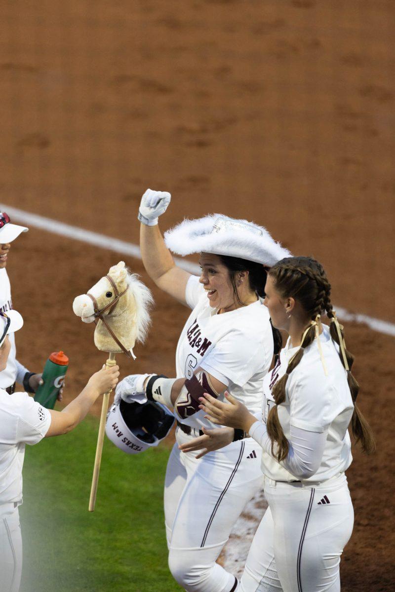 Senior INF Trinity Cannon celebrates with her team after hitting a home run during Texas A&M's game against UNT on March 6, 2024 at Davis Diamond. (Jaime Rowe/The Battalion)