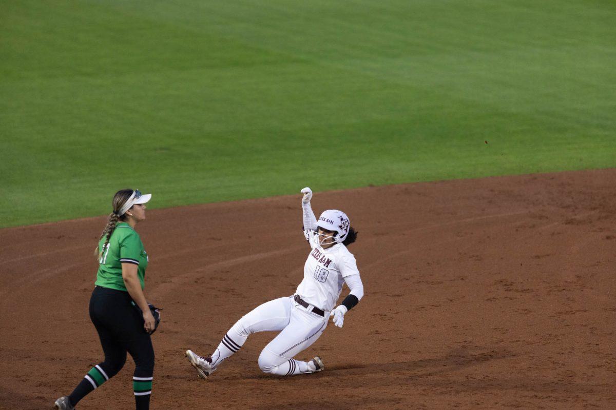 Sophomore OF Keely Williams (18) slides into third base during Texas A&Ms game against UNT on March 6, 2024 at Davis Diamond. (Jaime Rowe/The Battalion)