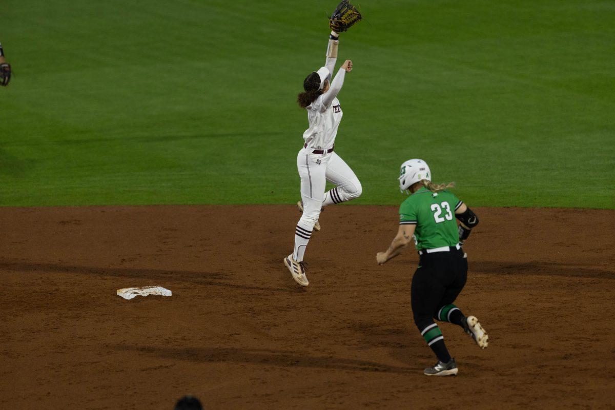 Sophomore INF Amari Harper (13) catches the ball during Texas A&Ms game against UNT on March 6, 2024 at Davis Diamond. (Jaime Rowe/The Battalion)