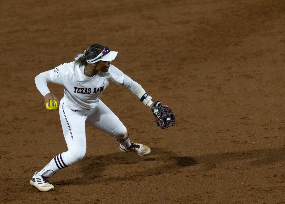 Sophomore INF Kennedy Powell (1) throws the ball to first base during Texas A&Ms game against UNT on March 6, 2024 at Davis Diamond. (Jaime Rowe/The Battalion)