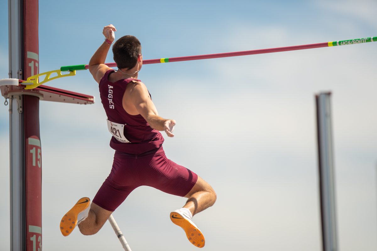 Freshman pole vaulter Ryley Klefstad lands past the pole during the Texas A&M 44 Farms Invitational Meet on Friday, April 5, 2024, at E. B. Cushing Stadium.(Adriano Espinosa/The Battalion)