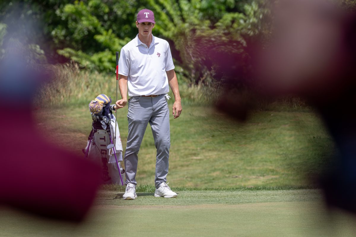 Texas A&M sophomore Jaime Montojo studies the green during The Aggie Invitational on Saturday, April 6, 2024, at Traditions Golf Club. (CJ Smith/The Battalion)