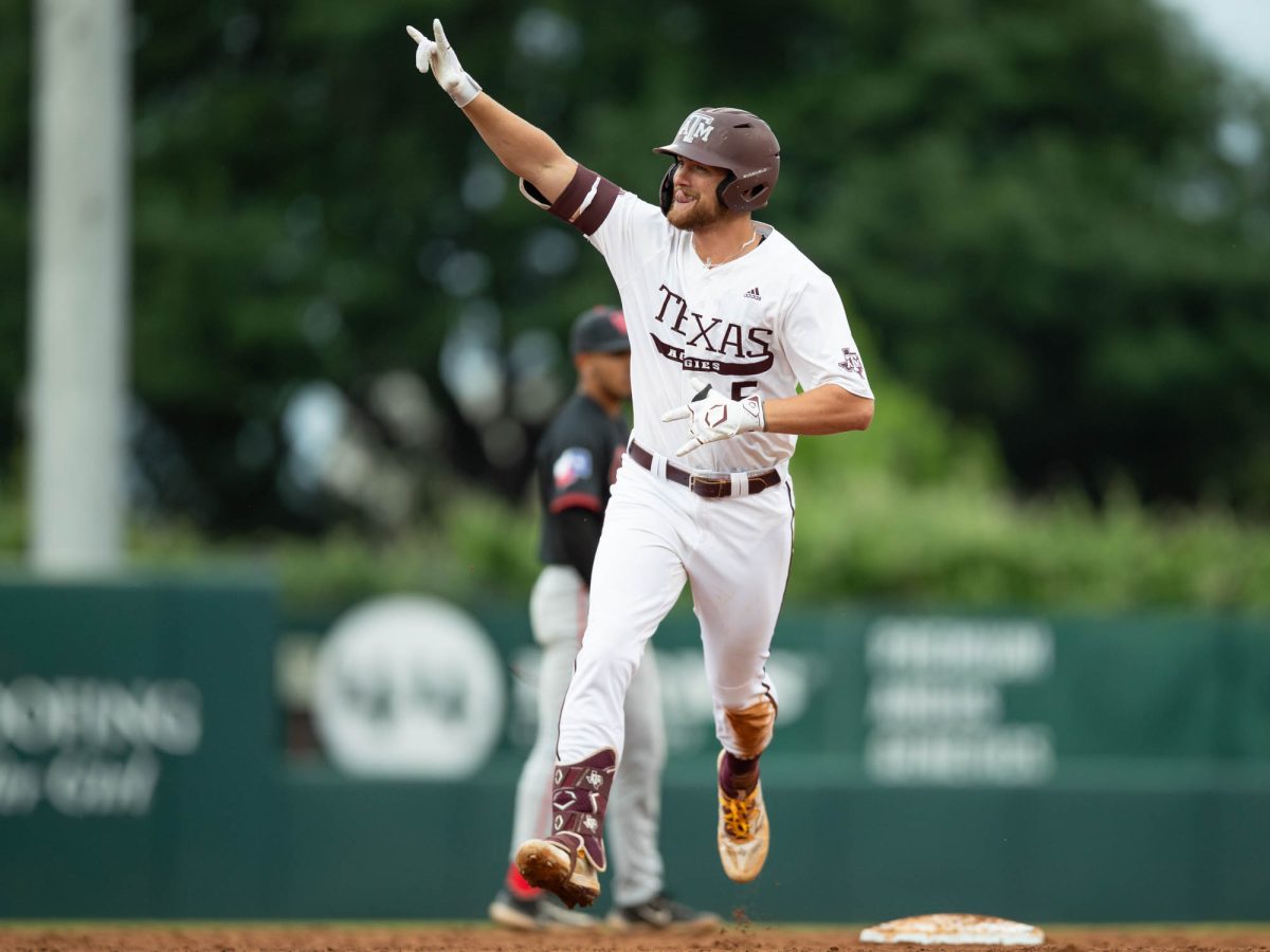 Texas A&M DH Hayden Schott (5) celebrating a home run during Texas A&M’s game against The University of Houston on Tuesday, April 23, 2024 at Olsen Field. (Hannah Harrison/The Battalion)