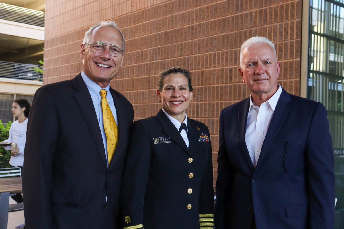 (Left to right)Chris Schueler of Christoper Production, DrPH, MCP, Captain, USPHS, and Director with the National Park Service, Sara Newman, and Former Assistant Secretary of Health Dr. Brett Giroir posed during the National Public Health Week: Invisible Corps Screening and Panel in Innovative Learning Classroom Building (ILCB) 111, Wednesday April 4, 2024.(Ashely Bautista/The Battalion)