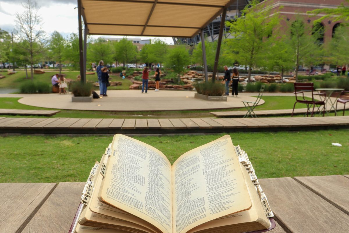 A Bible in the amphitheater in Aggie Park, where Sent has their monthly meetings, on Wednesday, April 10, 2024. (Ashely Bautista/The Battalion)