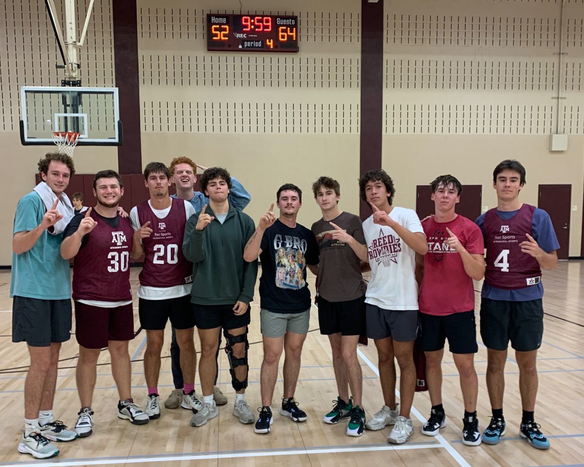 The Loser Bracket Champs stand for a photo after winning a playoff game on Dec. 4, 2023. They will head to the 2024 rec league basketball playoffs on April 3, 2024. (Ashley Brand/JOUR 359 Contributor)